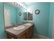 The primary bath has dual sinks with granite countertops and sleek faucets in a well-lit space at 5206 Mandalay Springs Dr # 204, Las Vegas, NV 89120