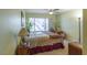 Well-lit bedroom featuring a cozy bed and large window, creating a relaxing ambiance at 5206 Mandalay Springs Dr # 204, Las Vegas, NV 89120
