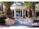 Elegant clubhouse entrance with white columns, perfect for gathering at 5206 Mandalay Springs Dr # 204, Las Vegas, NV 89120
