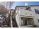 Exterior of the property featuring a staircase leading to the entrance and an upper-level balcony at 5206 Mandalay Springs Dr # 204, Las Vegas, NV 89120