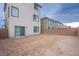 Large backyard with brick wall; ample space for creating your dream outdoor living area at 5748 Avondale Rise Way, Las Vegas, NV 89141