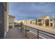 Balcony view overlooking a neat residential street with similar modern houses in a quiet neighborhood at 5748 Avondale Rise Way, Las Vegas, NV 89141
