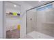 Modern bathroom showcasing a tile shower and walk-in closet at 5748 Avondale Rise Way, Las Vegas, NV 89141