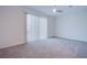 Bedroom showcasing a ceiling fan and sliding glass door at 5748 Avondale Rise Way, Las Vegas, NV 89141
