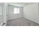 Bedroom featuring carpet floors and natural light from a window at 5748 Avondale Rise Way, Las Vegas, NV 89141