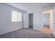 Cozy bedroom with a closet and an open doorway to the hall at 5748 Avondale Rise Way, Las Vegas, NV 89141