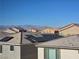 Residential roofs with solar panels and mountain views create a sustainable and scenic atmosphere at 5748 Avondale Rise Way, Las Vegas, NV 89141