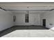 Spacious two-car garage with concrete floor and white walls, ready for customization at 5748 Avondale Rise Way, Las Vegas, NV 89141