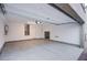 Spacious two car garage with access door to storage area and water heater at 5748 Avondale Rise Way, Las Vegas, NV 89141