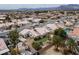 Charming single-story house with manicured lawn, mature landscaping, and a sparkling blue pool in a well-kept neighborhood at 6440 Break Point Ave, Las Vegas, NV 89130