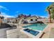 Inviting backyard oasis with a sparkling in-ground pool and spa, perfect for relaxation and entertaining at 6782 Bonillo Dr, Las Vegas, NV 89103