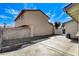 Spacious backyard with a concrete pad area and rock landscaping offering versatility at 6782 Bonillo Dr, Las Vegas, NV 89103