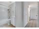 Tiled bathroom featuring a shower-tub combination and a single sink at 6782 Bonillo Dr, Las Vegas, NV 89103