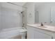 Bathroom features a shower-tub combination, single sink, and tile at 6782 Bonillo Dr, Las Vegas, NV 89103