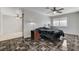 Bedroom featuring neutral walls, fan, and tile flooring at 6782 Bonillo Dr, Las Vegas, NV 89103