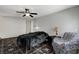 Spacious bedroom with fan and neutral walls at 6782 Bonillo Dr, Las Vegas, NV 89103