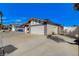 Charming single-story home with a two-car garage and a wide driveway at 6782 Bonillo Dr, Las Vegas, NV 89103