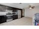 Kitchen boasting stainless steel appliances and ample cabinet space at 6782 Bonillo Dr, Las Vegas, NV 89103