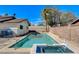 Outdoor pool and jacuzzi with a backyard view at 6782 Bonillo Dr, Las Vegas, NV 89103