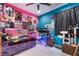 Bedroom with a colorful design scheme and posters at 7904 Mountain Point Ave, Las Vegas, NV 89131