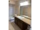 Bathroom featuring a single sink, granite countertops, and tile flooring at 8101 W Flamingo Rd # 2040, Las Vegas, NV 89147