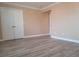 The room features wood-style flooring, and a spacious closet at 8101 W Flamingo Rd # 2040, Las Vegas, NV 89147