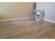 Bedroom featuring wood-look floors and a desk at 8101 W Flamingo Rd # 2040, Las Vegas, NV 89147