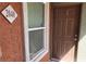 Exterior view of front door of unit 2040 with a window at 8101 W Flamingo Rd # 2040, Las Vegas, NV 89147