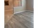 Bright living room showcasing wood-style flooring and an open layout at 8101 W Flamingo Rd # 2040, Las Vegas, NV 89147