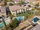 Sprawling backyard oasis with a pool, lush landscaping, and exterior access from the main living area at 8425 Cambrils Ave, Las Vegas, NV 89178
