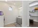 Bright bathroom with a gray vanity and marble countertop plus a walk-in closet for ample storage at 8425 Cambrils Ave, Las Vegas, NV 89178