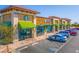 Commercial building with a coffee shop, retail stores, and parking lot at 8425 Cambrils Ave, Las Vegas, NV 89178