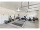 Open garage space with weights and exercise equipment at 8425 Cambrils Ave, Las Vegas, NV 89178