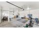 Spacious garage featuring workout equipment and storage at 8425 Cambrils Ave, Las Vegas, NV 89178