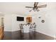 Cozy loft space with a wet bar and a ceiling fan at 8425 Cambrils Ave, Las Vegas, NV 89178