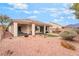 Expansive backyard with covered patio and outdoor kitchen, perfect for entertaining at 8506 River Ridge Dr, Las Vegas, NV 89131