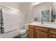 Bathroom featuring a shower-tub combo with modern vanity at 8506 River Ridge Dr, Las Vegas, NV 89131