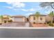 Charming single-story home with a well-manicured front yard and three car garage at 8506 River Ridge Dr, Las Vegas, NV 89131