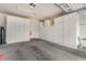 Spacious garage with lots of white cabinets for storage and organization at 8506 River Ridge Dr, Las Vegas, NV 89131