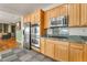 Well-equipped kitchen showcases stainless steel appliances and ample cabinet space at 8506 River Ridge Dr, Las Vegas, NV 89131