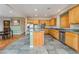 Bright kitchen features stainless appliances, generous countertops and a functional island at 8506 River Ridge Dr, Las Vegas, NV 89131