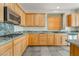 Spacious kitchen featuring granite counters, ample cabinetry, and stainless steel appliances at 8506 River Ridge Dr, Las Vegas, NV 89131