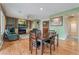 Cozy living room and dining area with hardwood floors and abundant natural light at 8506 River Ridge Dr, Las Vegas, NV 89131