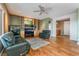 Inviting living room with hardwood floors, built in cabinets and recessed lighting at 8506 River Ridge Dr, Las Vegas, NV 89131
