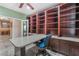 Office features custom-built shelving, providing ample storage and workspace at 8506 River Ridge Dr, Las Vegas, NV 89131
