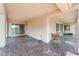 Covered patio with tiled floor, providing a comfortable outdoor living space at 8506 River Ridge Dr, Las Vegas, NV 89131