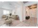 Bright and airy living room with neutral decor, stylish furnishings, and ample natural light at 8648 Cloverbelle St, Las Vegas, NV 89166