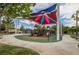 Community park featuring a colorful playground, shaded seating areas, and well-maintained green spaces at 8648 Cloverbelle St, Las Vegas, NV 89166
