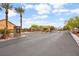 Gated community entrance with well-maintained landscaping and secure access at 9011 Tierra Santa Ave, Las Vegas, NV 89129