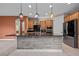 Kitchen with granite countertop, stainless steel appliances, and wood cabinets at 906 Majestic Vw, Mesquite, NV 89034
